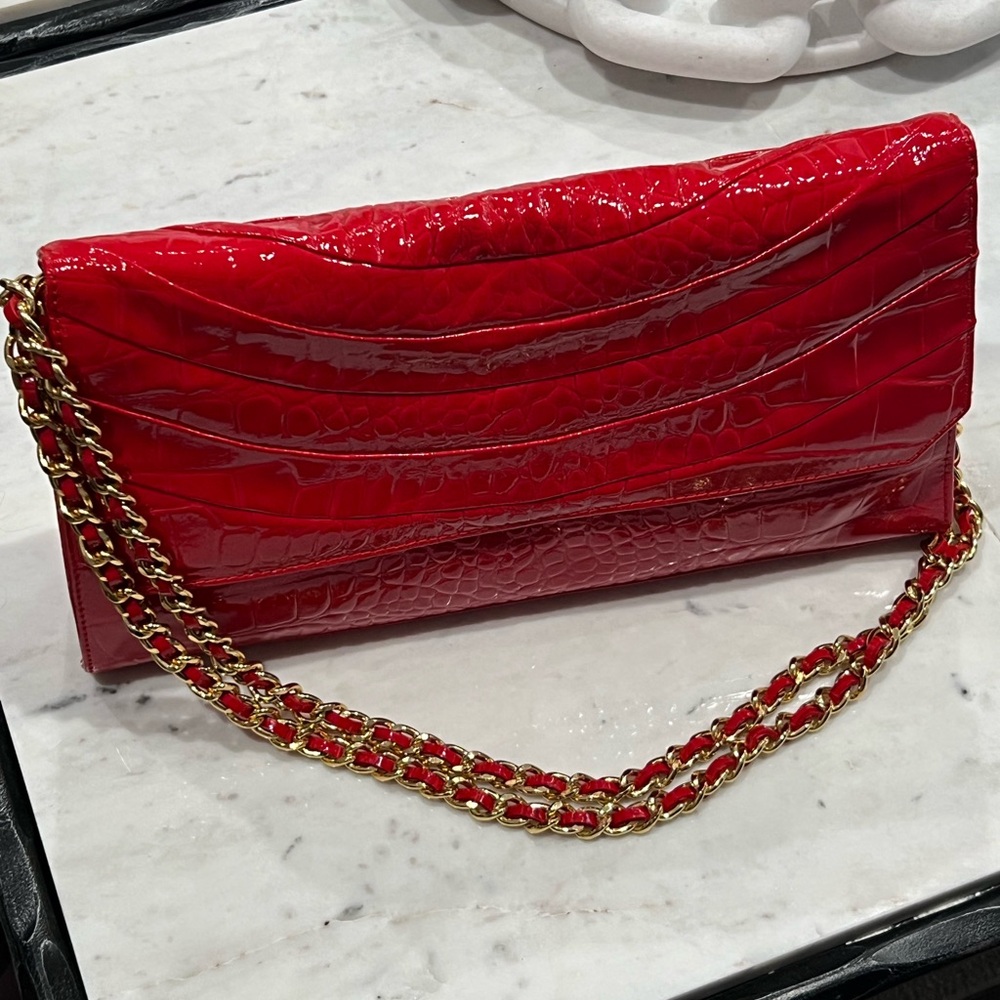 Saks Fifth Avenue Red Croc-Embossed Clutch with Gold Chain
Used once.